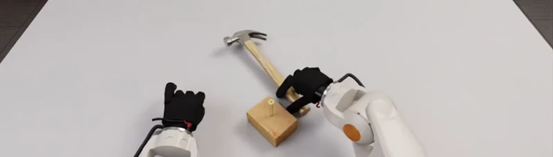 Hammering scene with a pale tabletop